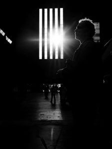 Dark room with man online camera shop photo