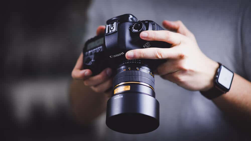 man holding camera