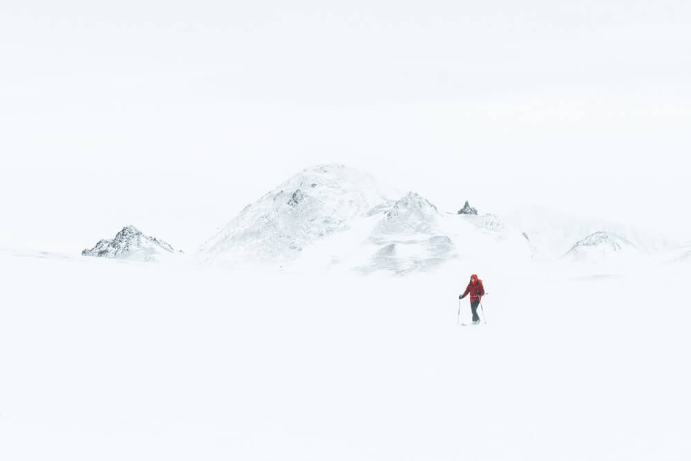 small figure in snow landscape