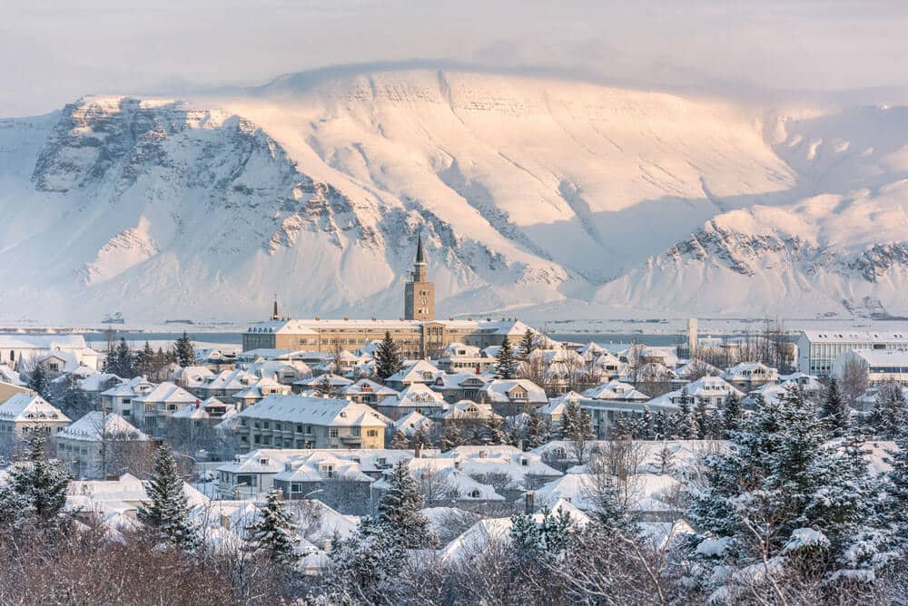 city landscape with mountain backdrop