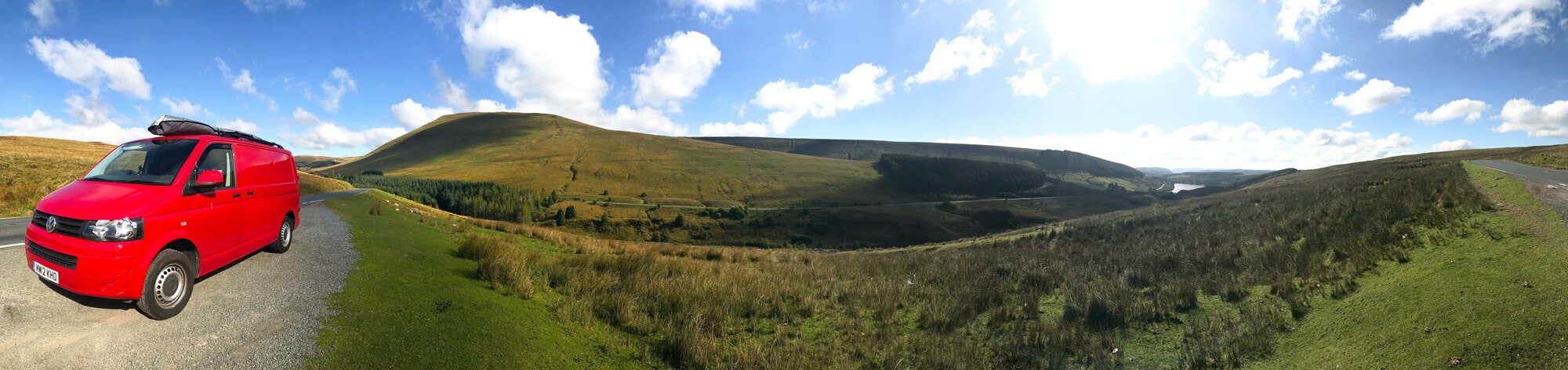 panorama of campervan in the hills