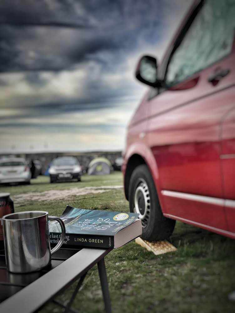Relaxing outside the campervan